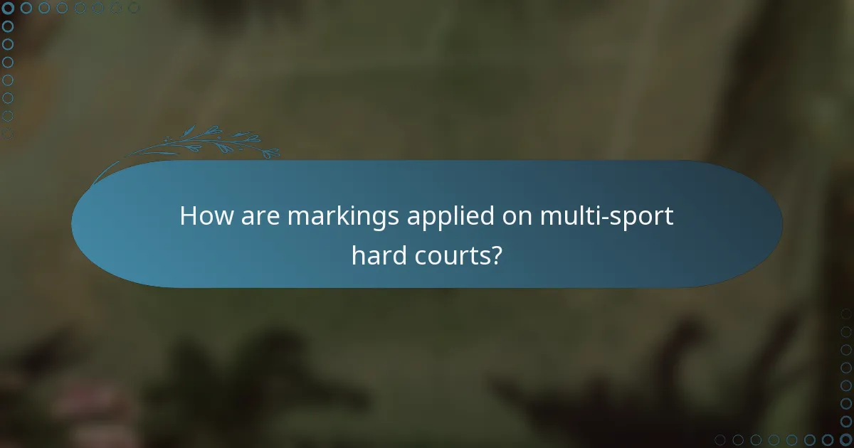 How are markings applied on multi-sport hard courts?