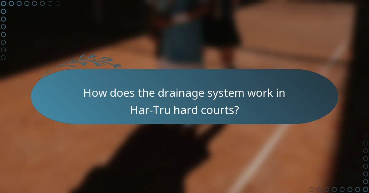 How does the drainage system work in Har-Tru hard courts?